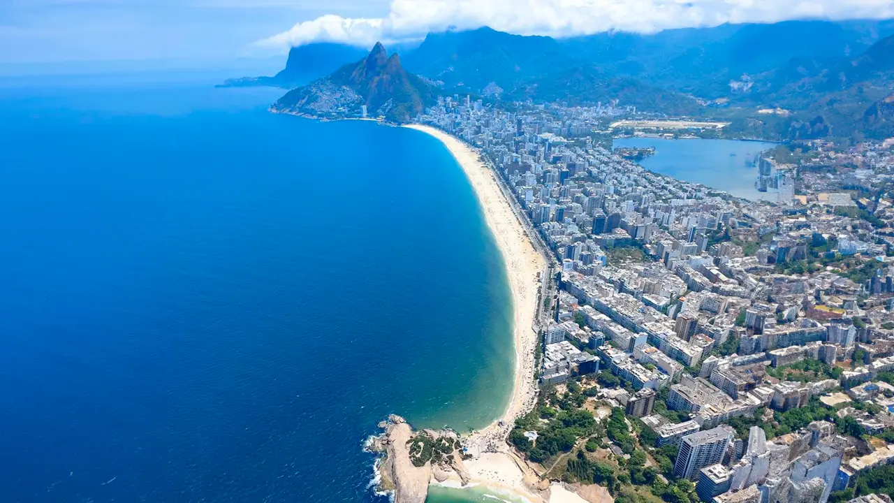 Aerial view of Christ Redeemer, Copacabana Beach, and Sugarloaf Mountain from a helicopter
